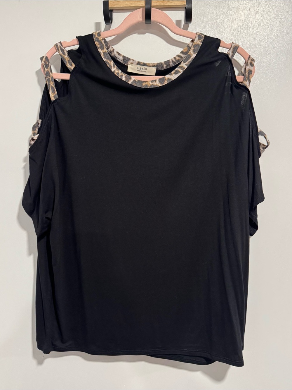 Cold-Shoulder Black Top with Leopard-Trim Accents